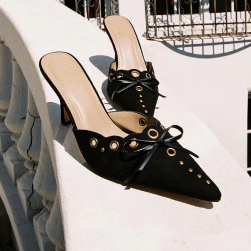Black pointy suede heels mules